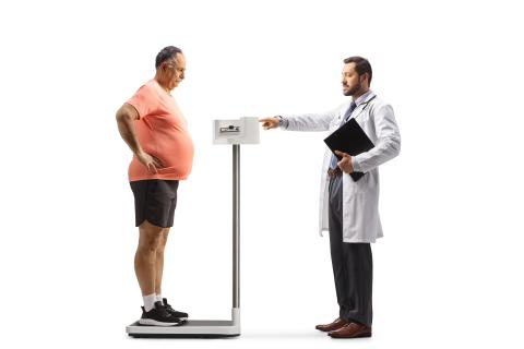 Doctor Measuring Weight